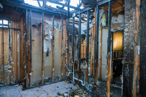 Professional Fire Damage Restoration technician working in Pinconning, MI